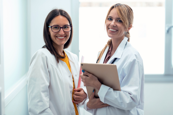 Nutritionist and Dietitian standing side by side