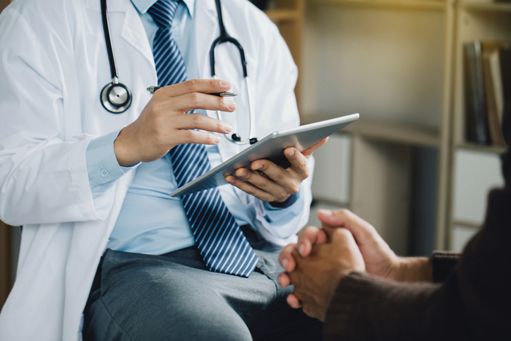 Doctor examining patient