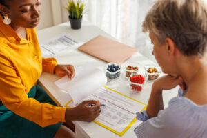 Female Nutritionist working with a client